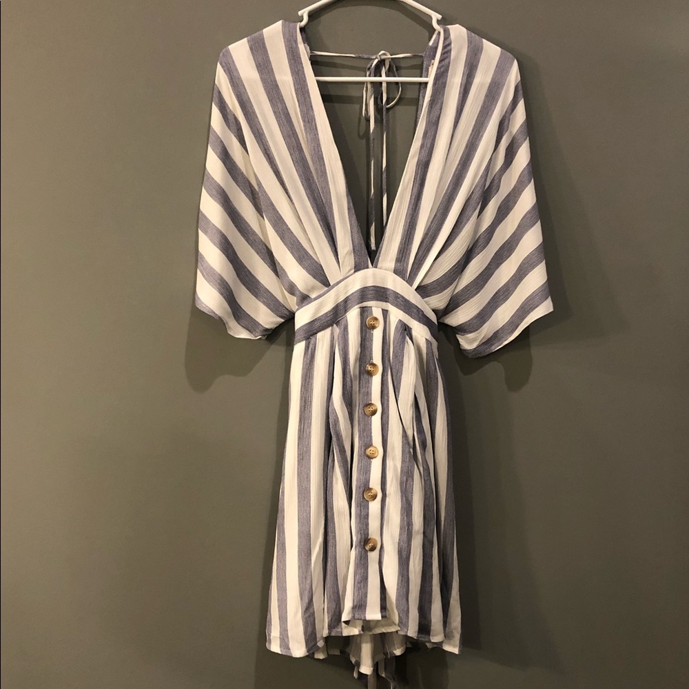 Essue plunge neck, open back dress